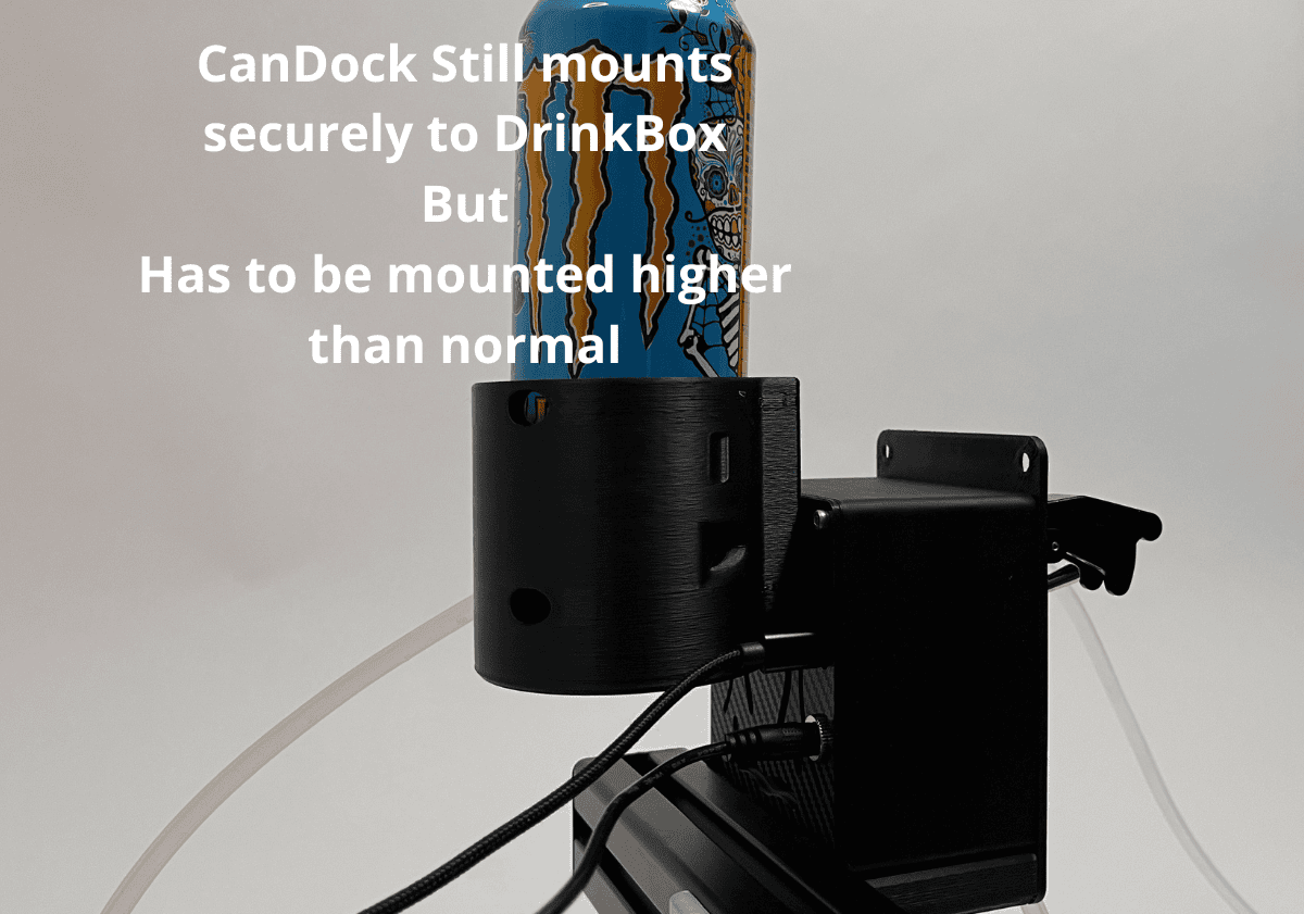 a sim racing drink box hydration unit mounted on a 4040 profile with a candock and blue can in it. White text on the left reads, 'CanDock Still mounts securely to DrinkBox But Has to be mounted higher than normal.