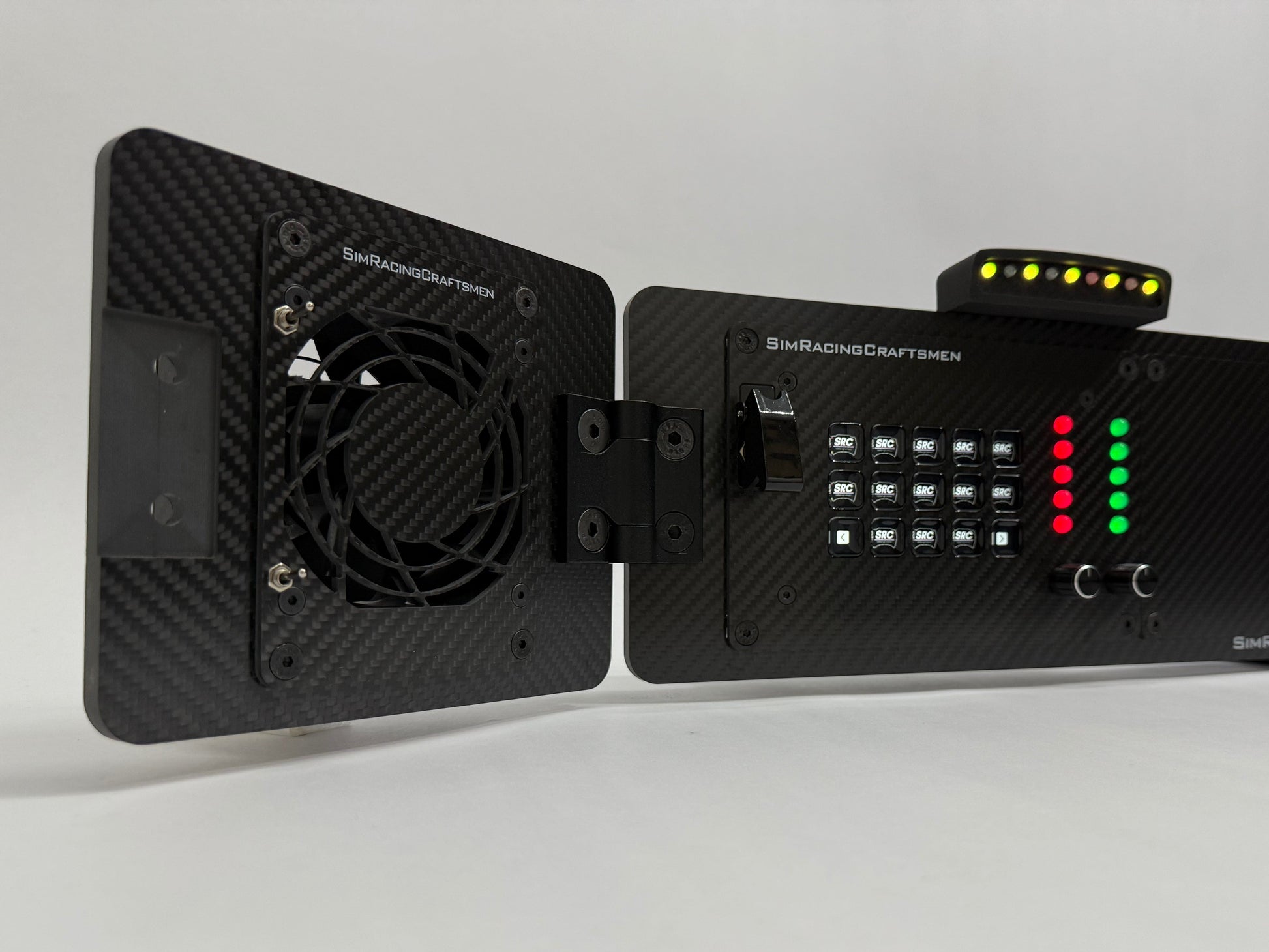 Black electronic device with fan and control panel on a white background