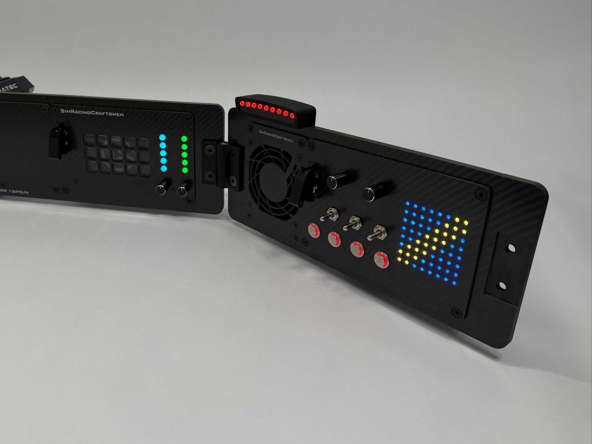 Black Button Box with digital display on a white surface