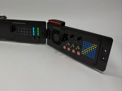 Black Button Box with digital display on a white surface