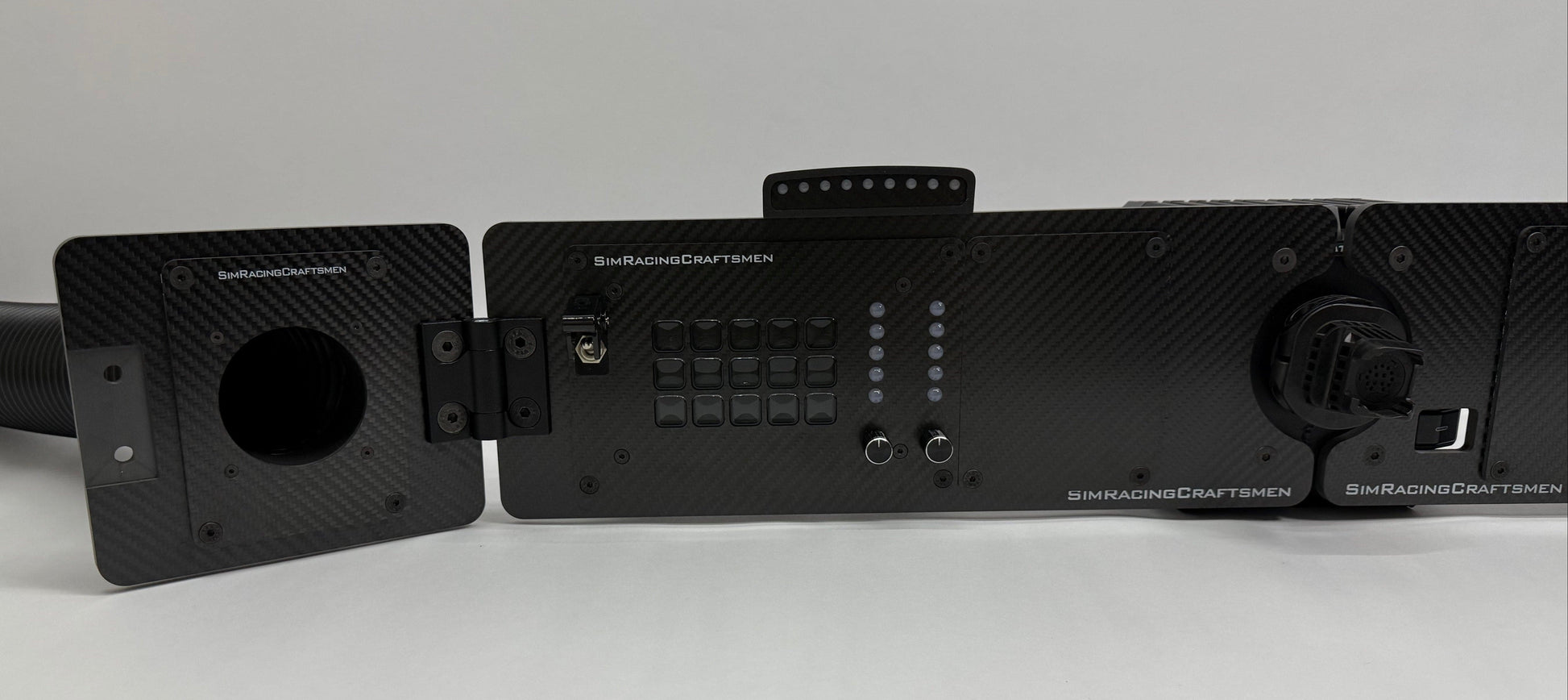 Left side of sim racing setup with sim brows and wind sim tube installed