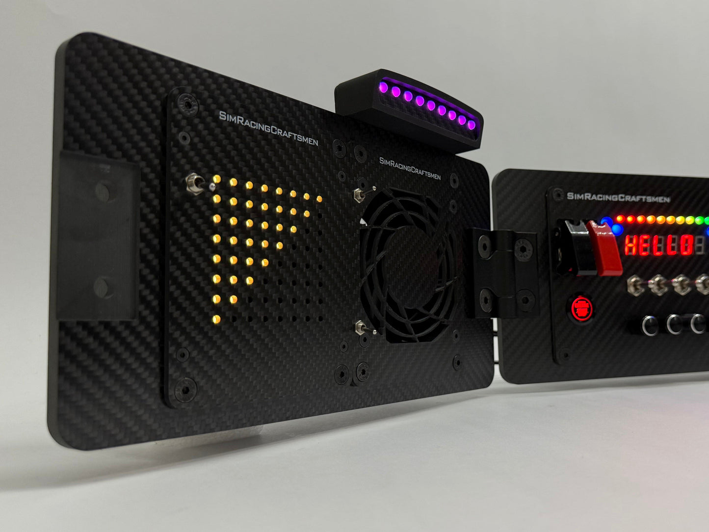 Carbon fiber button box with LED display and control buttons on a white background