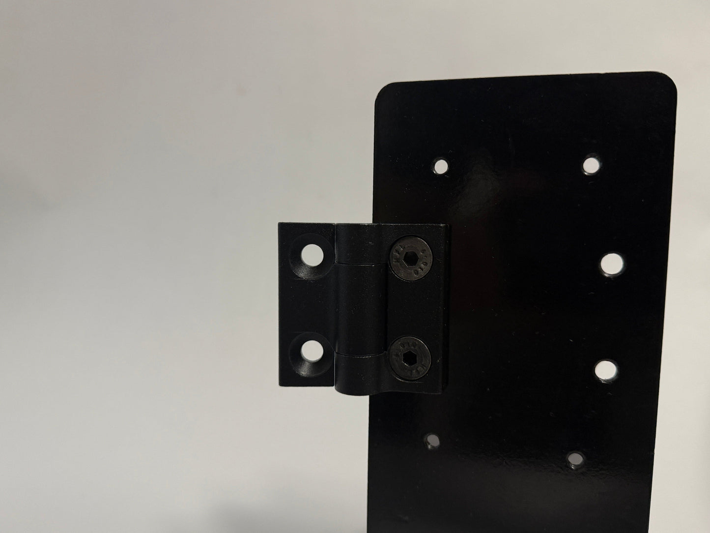 locking hinge mounted on desk mount