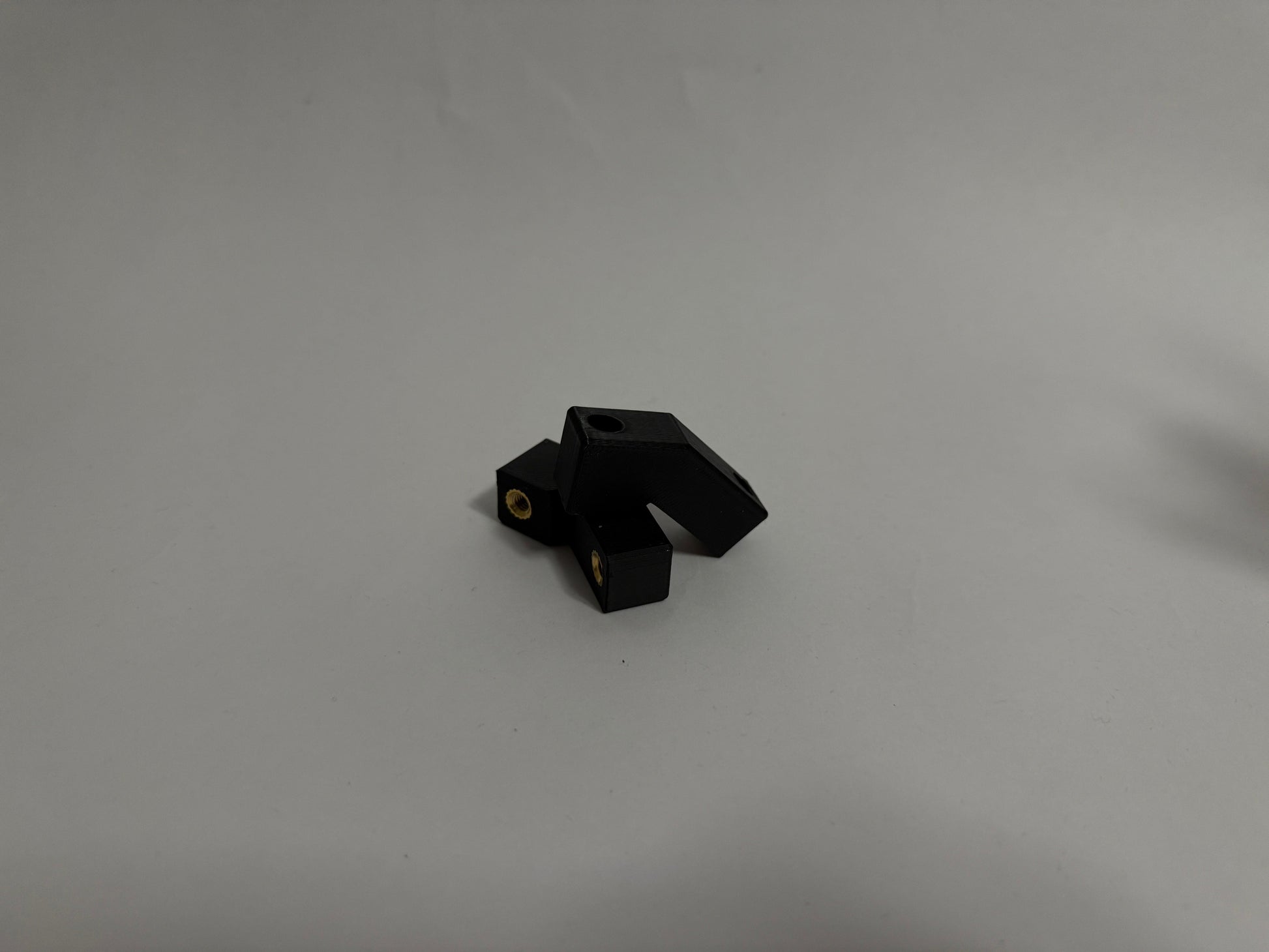 two ModuBlocks laying down on white background