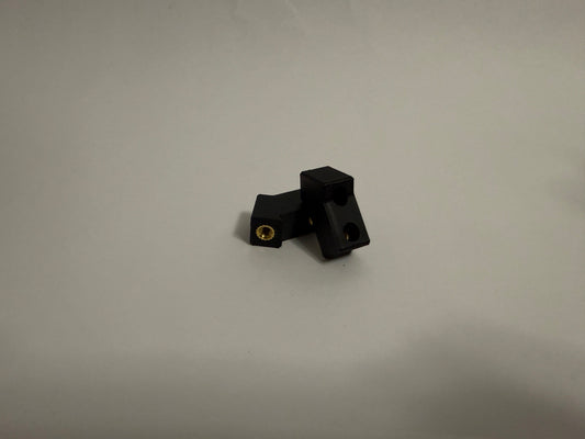 two ModuBlocks laying down on white background