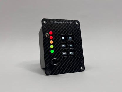 Black carbon fiber control panel with buttons and LED lights on a gray background