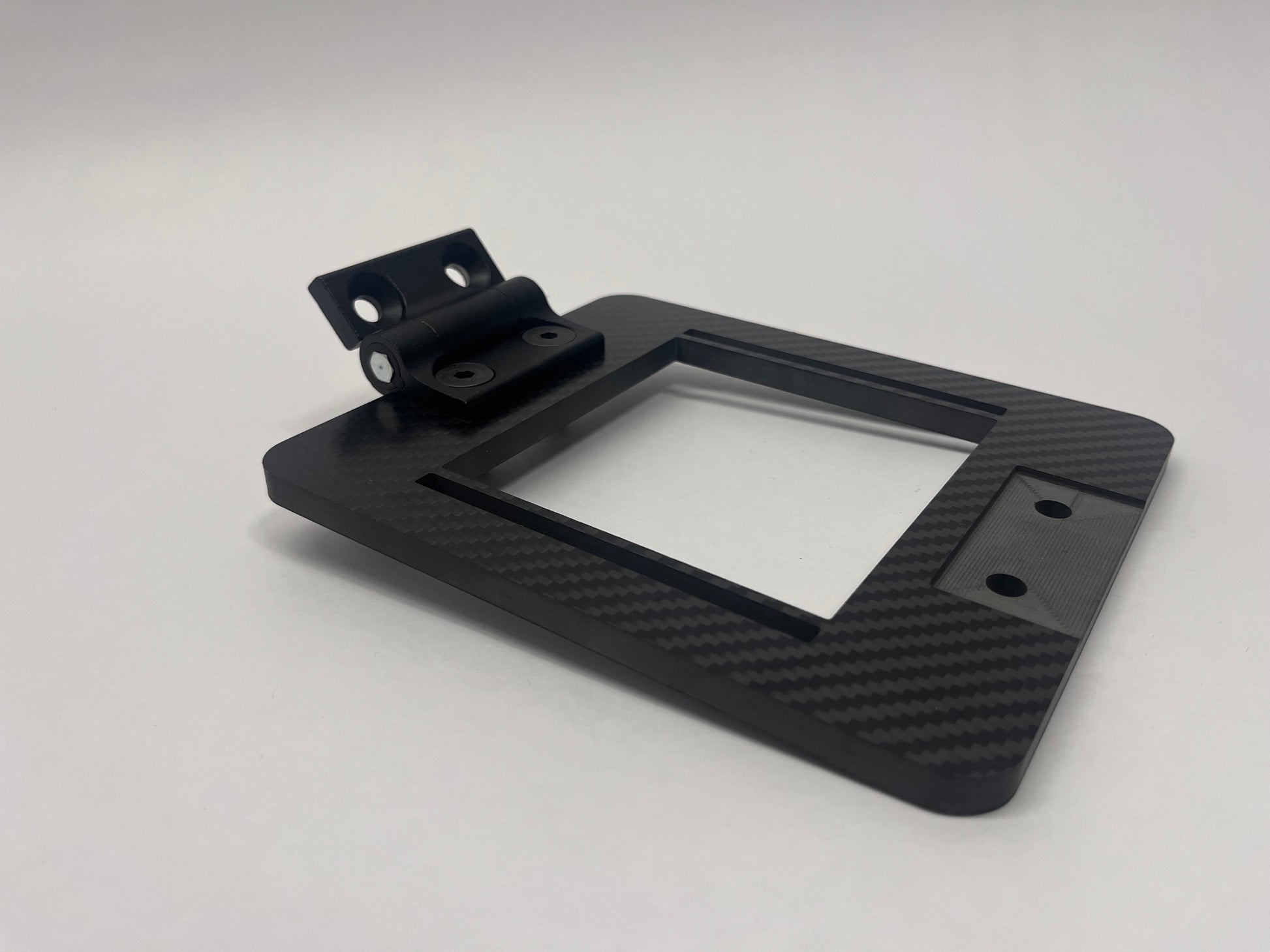 black metal hinge on a expansion bracket