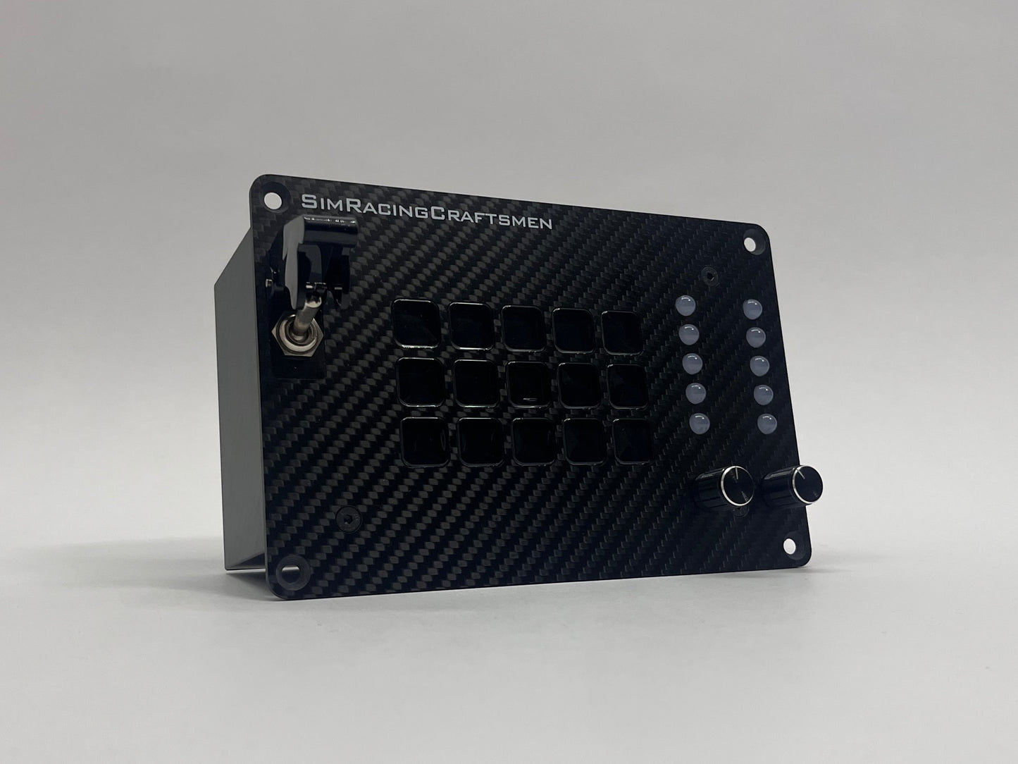 Black electronic module with 'SimRacingCraftmen' branding on a gray background