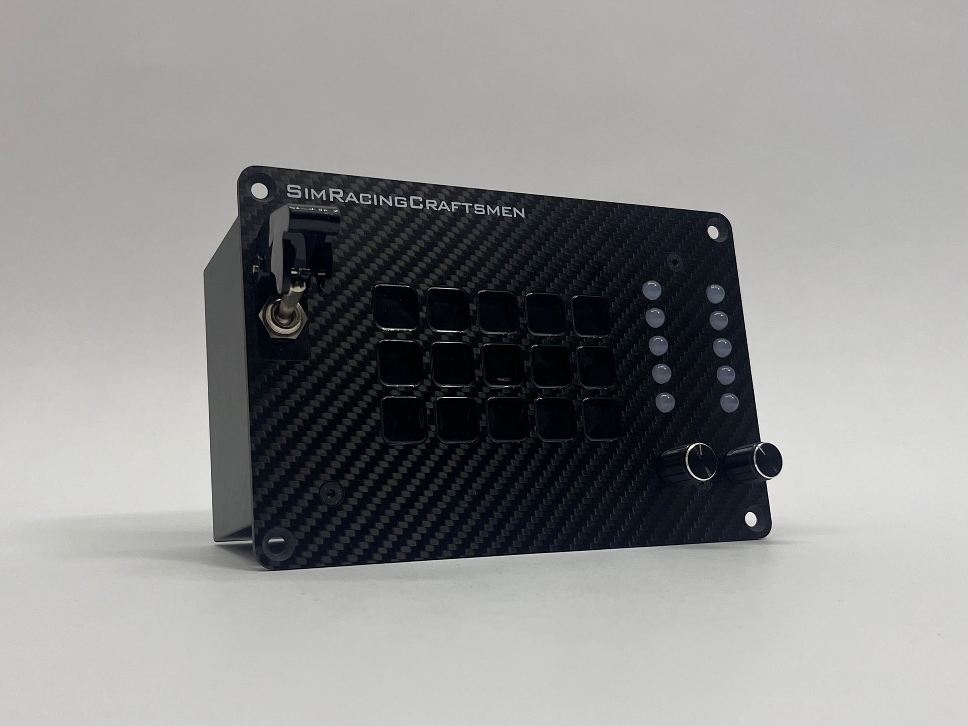 Black electronic module with 'SimRacingCraftmen' branding on a gray background