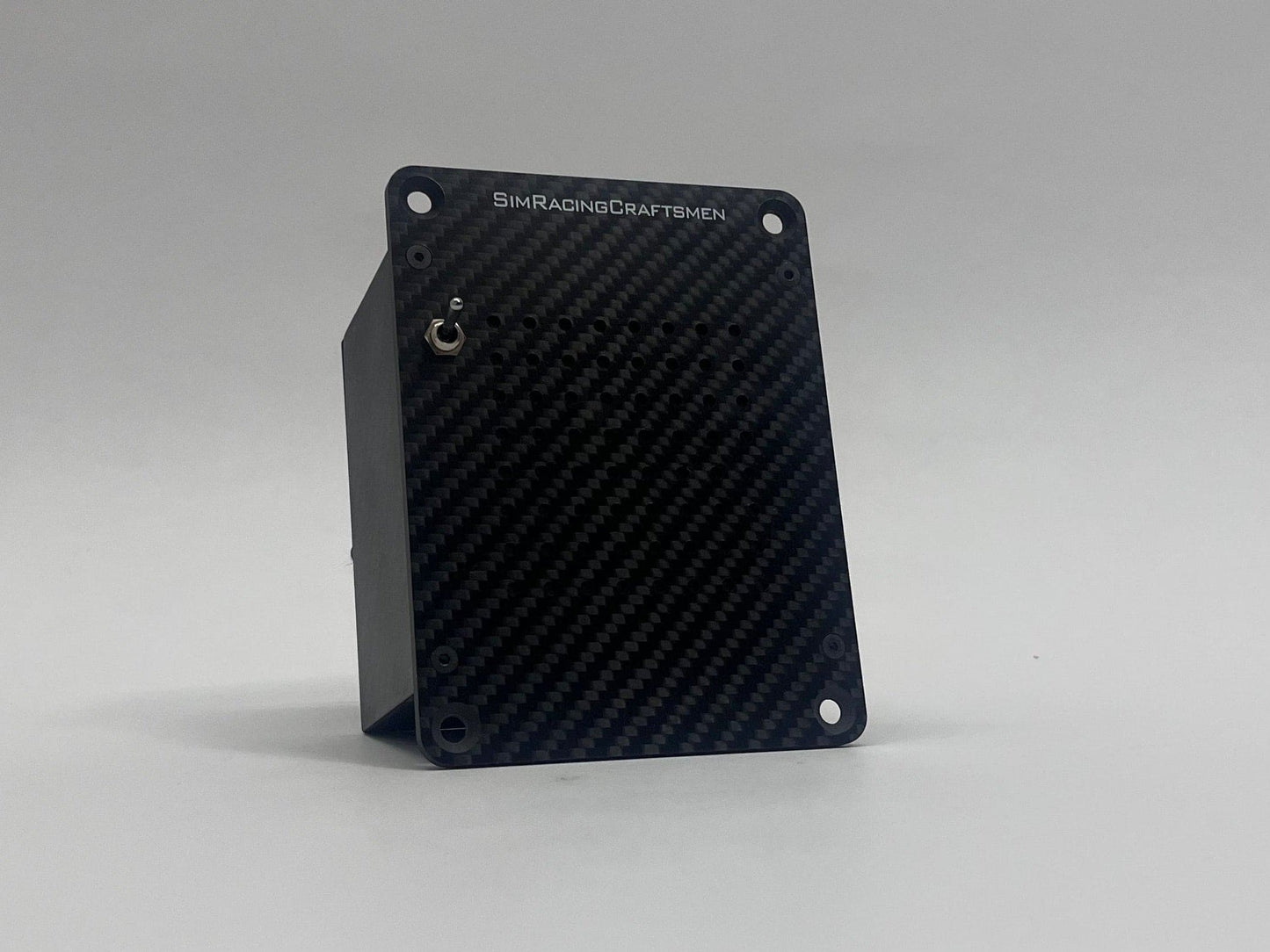 Carbon fiber panel with 'SimRacingCraftsmen' branding on a gray background