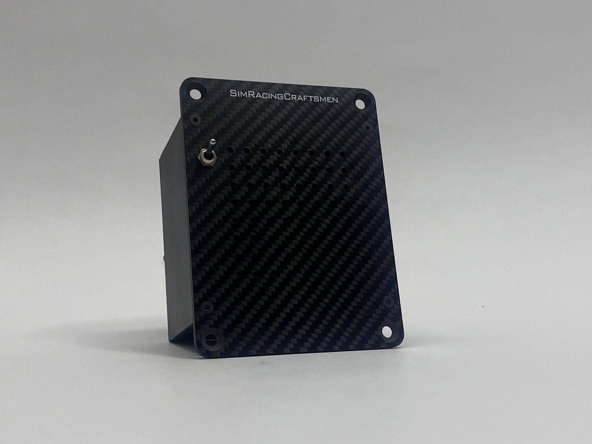 Carbon fiber panel with 'SimRacingCraftsmen' branding on a gray background