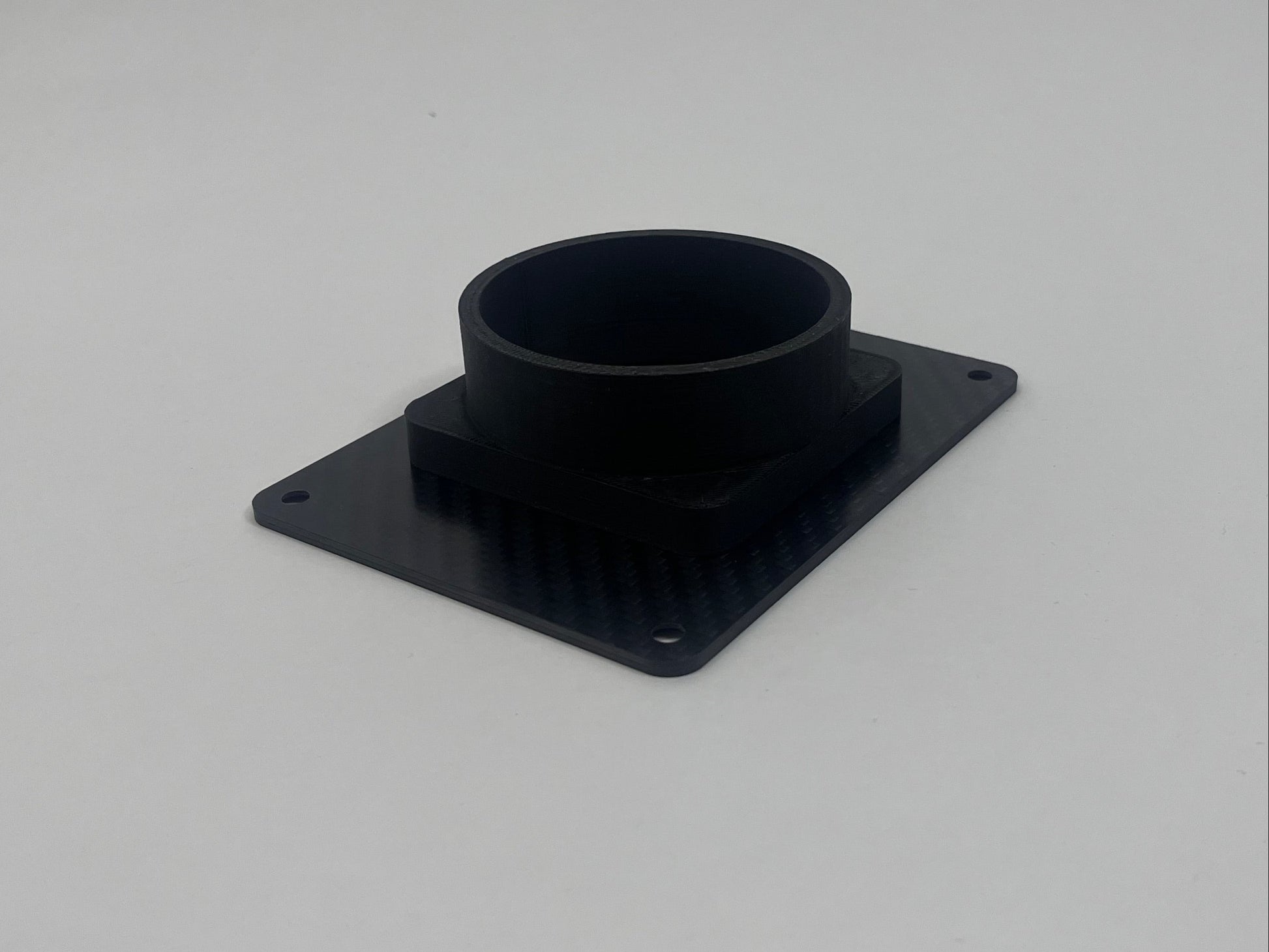 rear of carbon fiber plate showing plastic tube mount