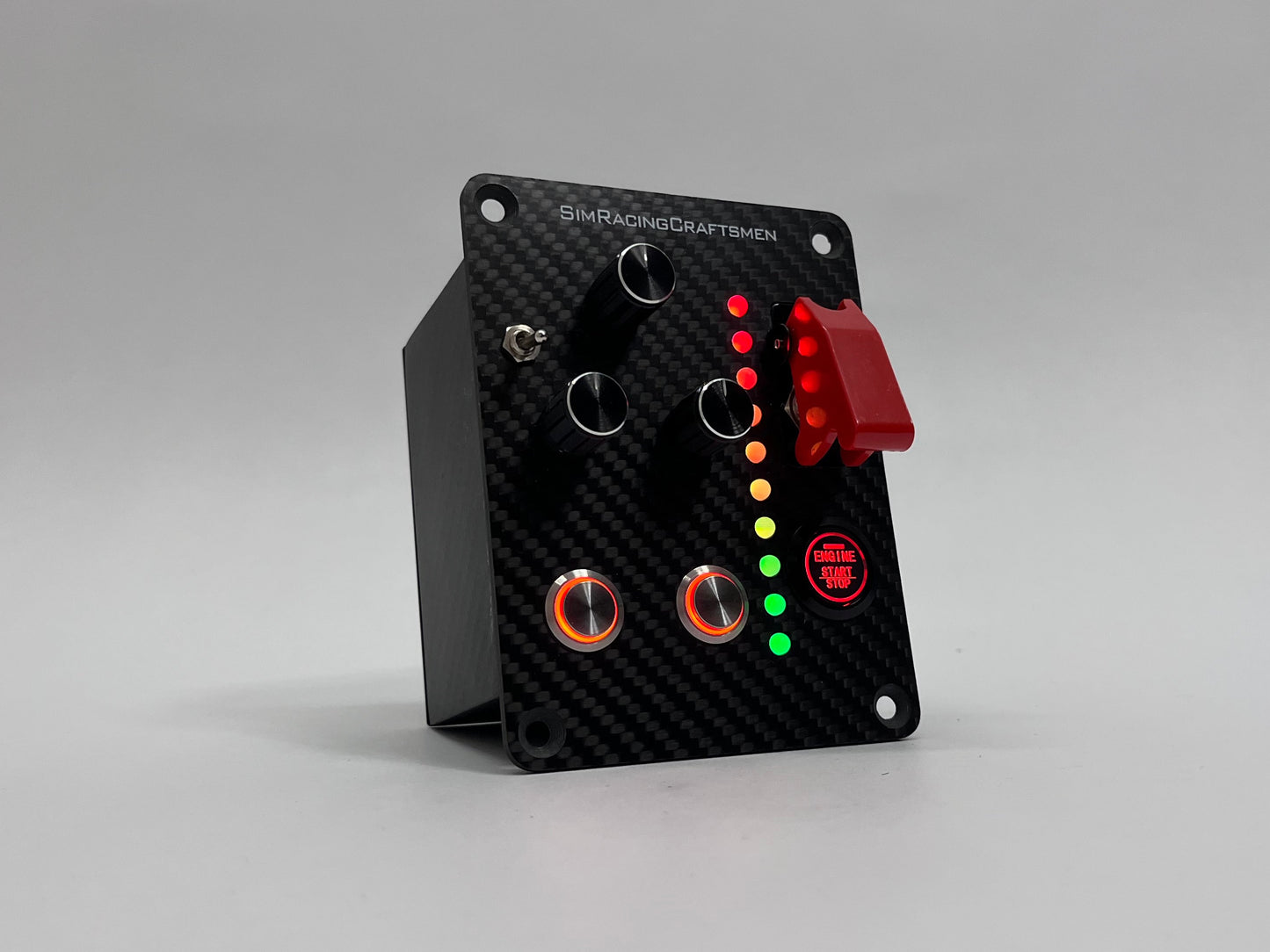 Carbon fiber button box with red safety cap shut