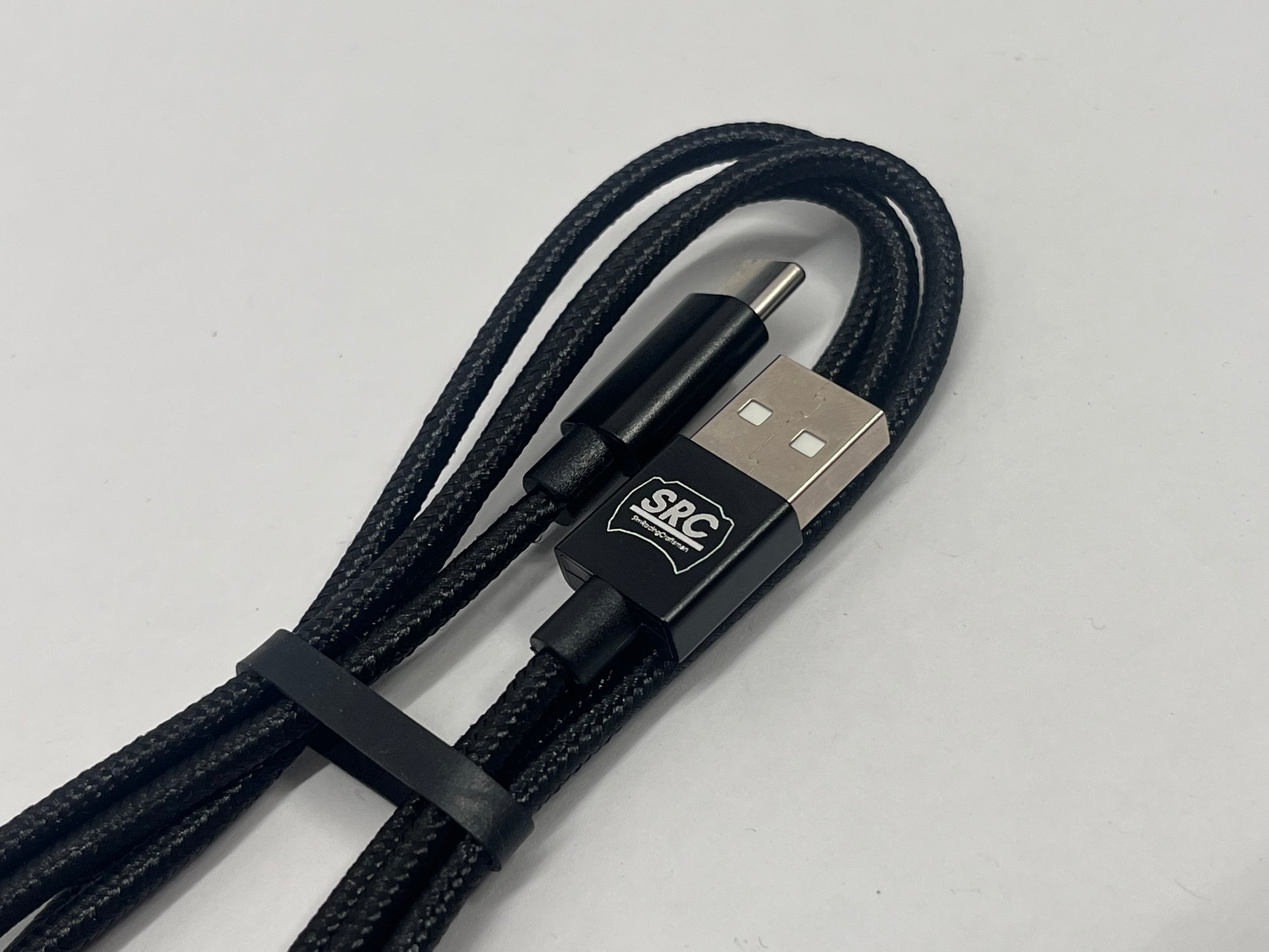 Black USB cable with a logo on a white background