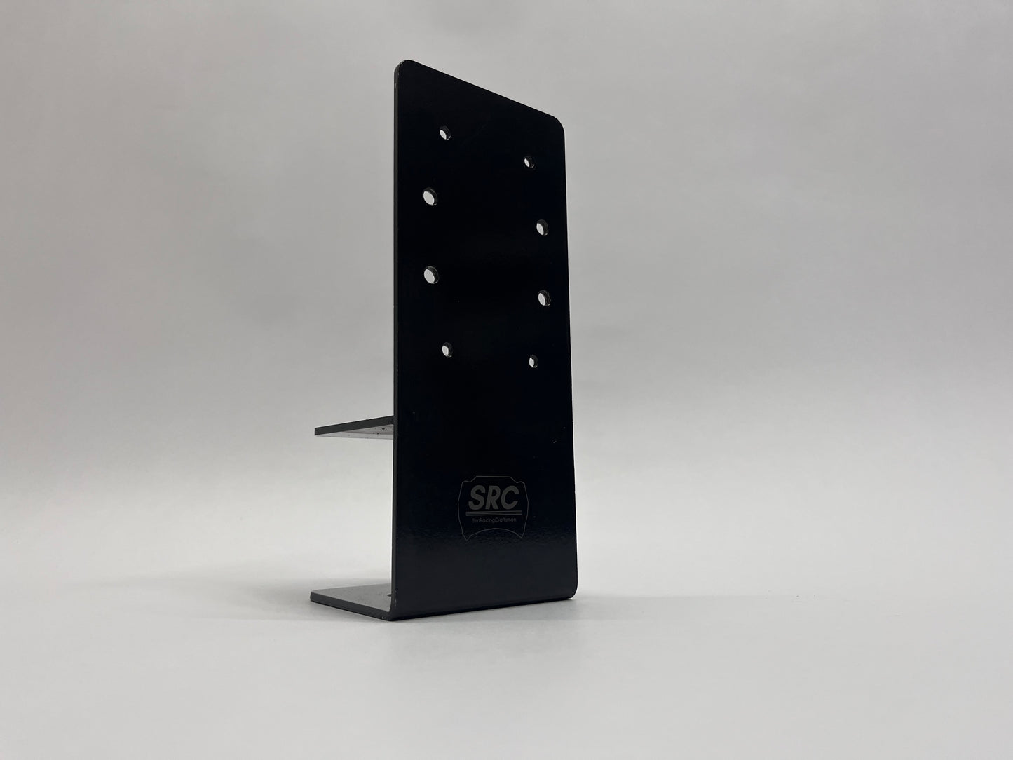 Front view of black desk mount on grey background