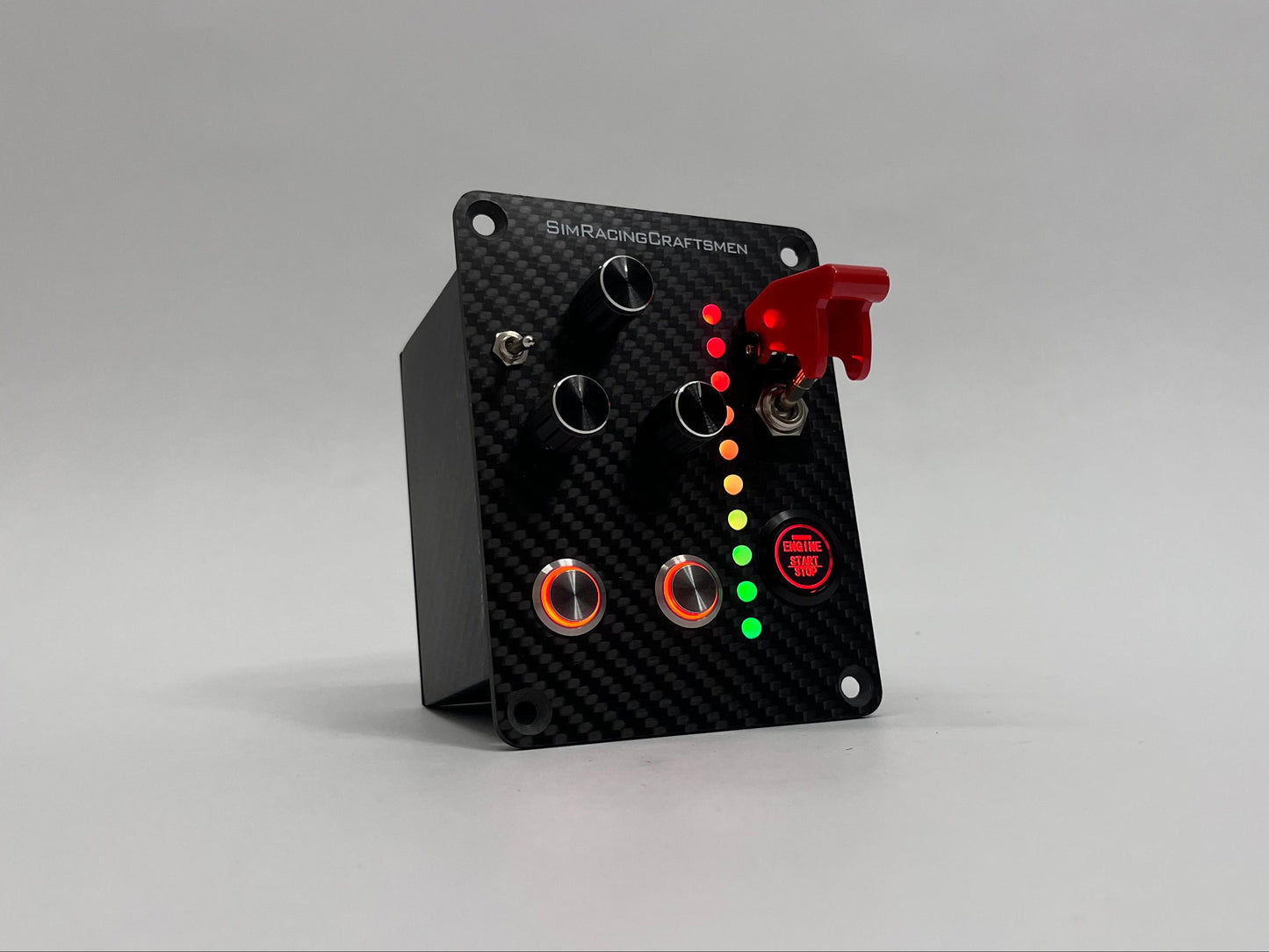 Carbon Fiber button box with red button and LED lights on a gray background