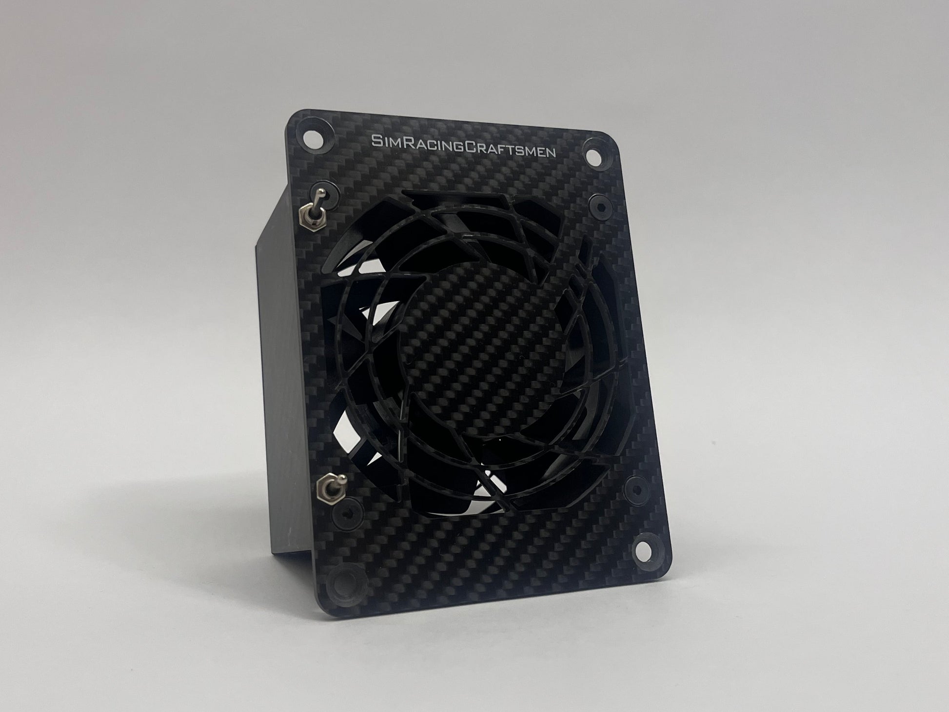 Black carbon fiber cooling fan on a gray background