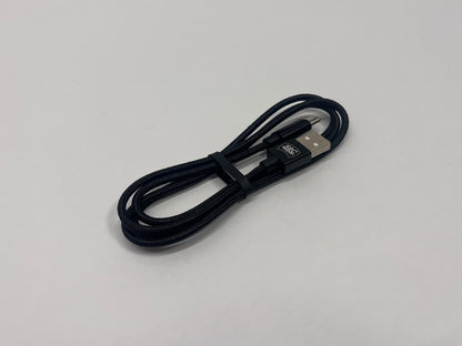 Black USB cable on a light gray background
