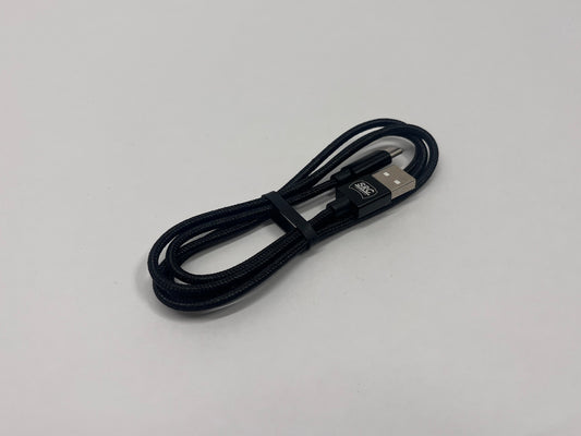 Black USB cable on a light gray background