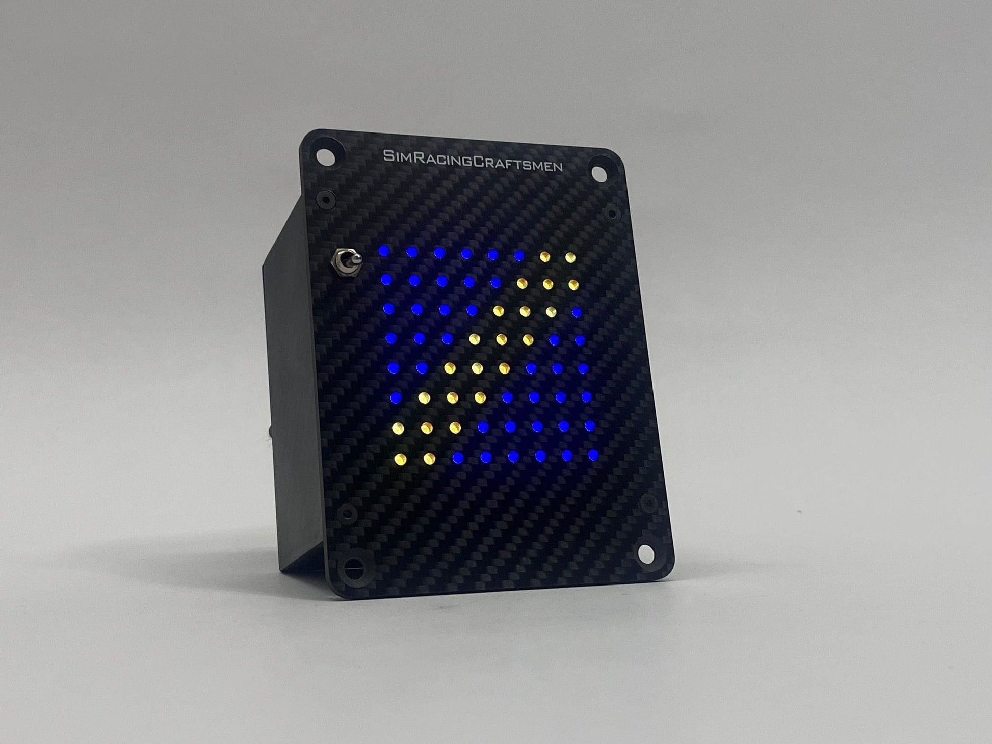carbon fiber button box with blue flag displayed on the matrix