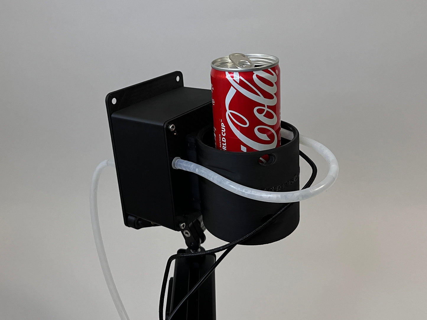 Rear of drinkbox with coca cola can in can holder