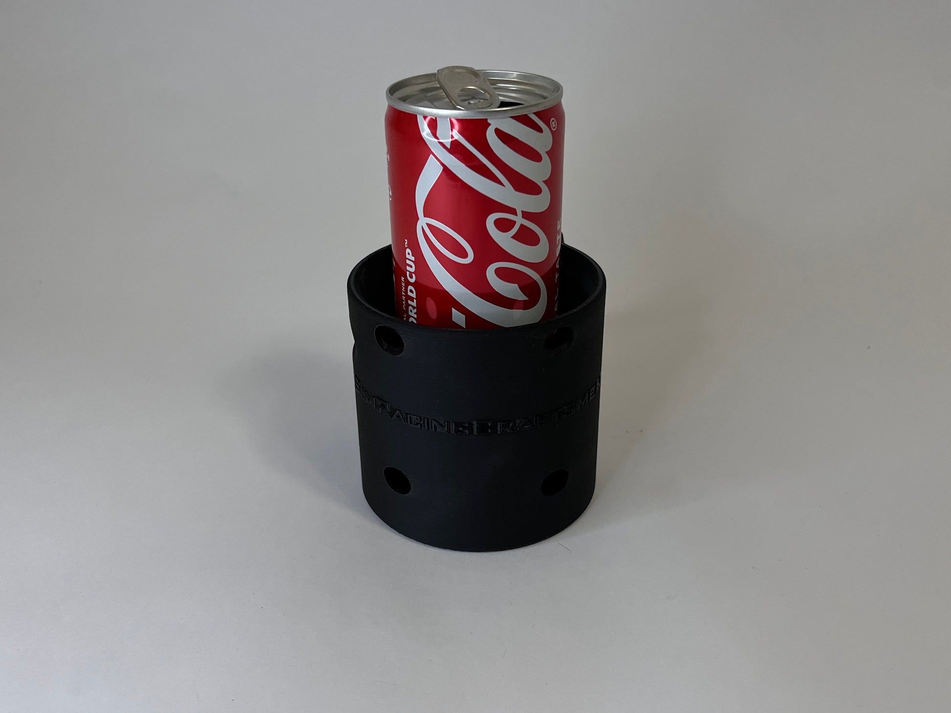 CanDock with Coca Cola slim can in it