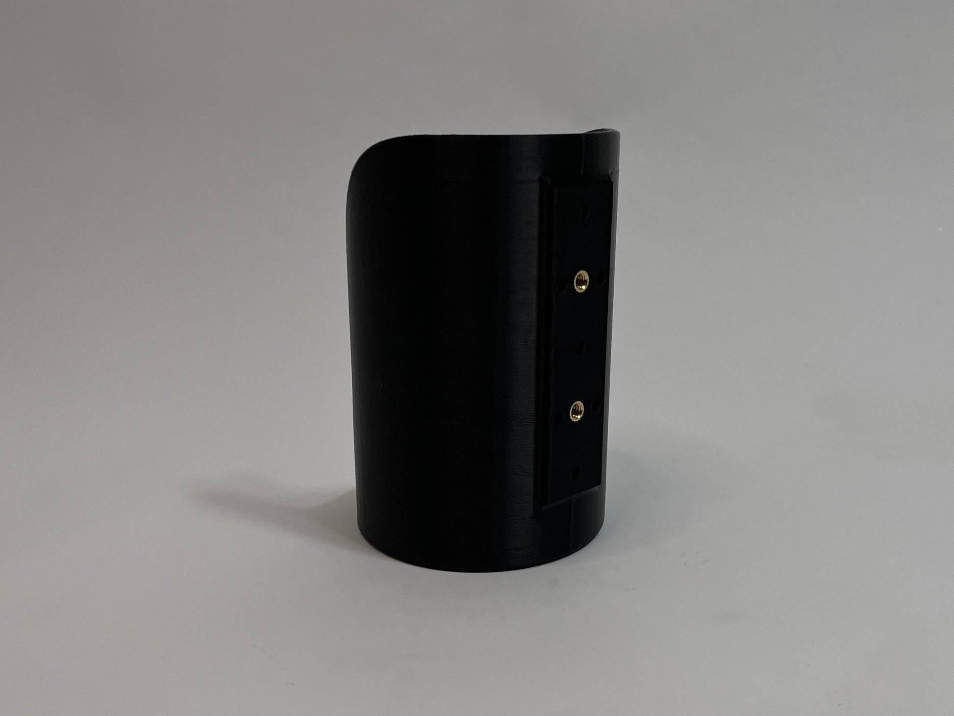 left rear of the bottle mount showing the left side with mounting holes