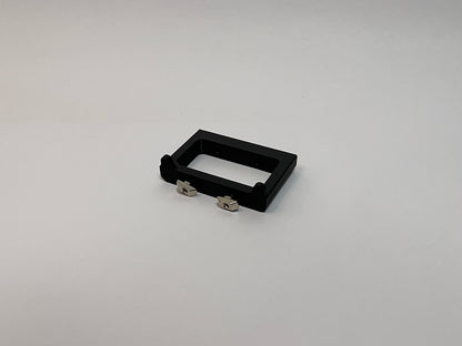 rear view of the button box solid mount showing 4040 profile mounting hardware installed on the mount on a white background