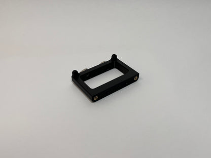 front side view of the button box solid mount showing 4040 profile mounting hardware installed on the mount on a white background
