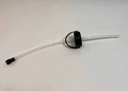 Sipping cap showing black cap with white silicone tubes on both sides with a black silicone bite valve on one side of the tubing on a white background