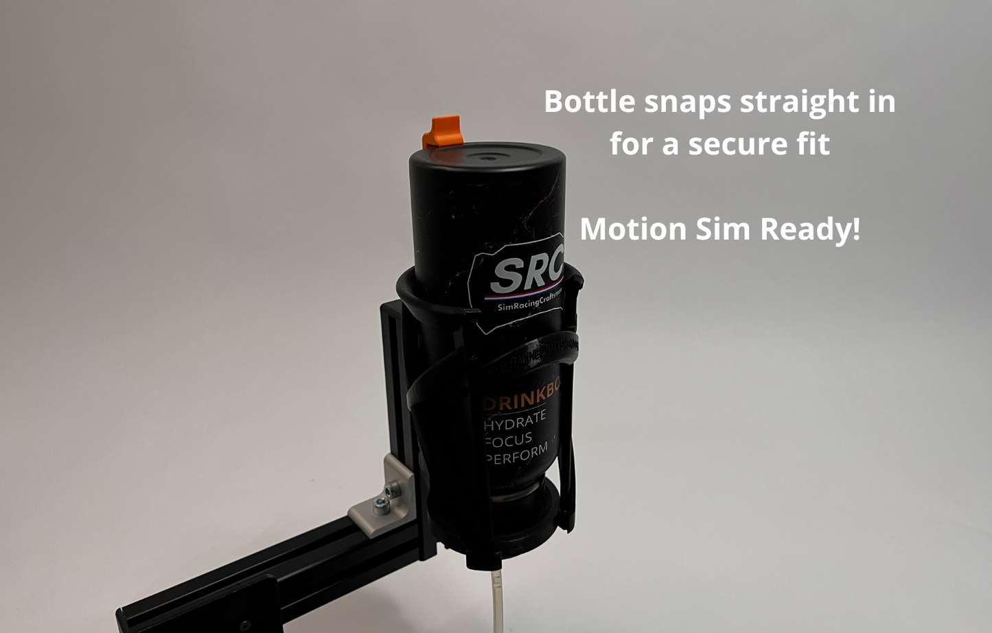 SRC race bottle mounted in racing hydration endurance bottle dock mounted on a vertical black 4040 profile against a light gray background. White text on the right reads 'Bottle snaps straight in for a secure fit' and 'Motion Sim Ready!'.