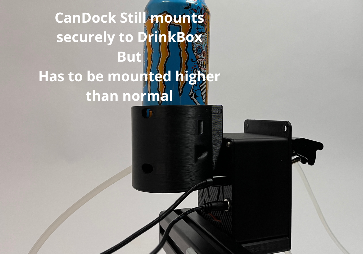 a sim racing drink box hydration unit mounted on a 4040 profile with a candock and blue can in it. White text on the left reads, 'CanDock Still mounts securely to DrinkBox But Has to be mounted higher than normal.
