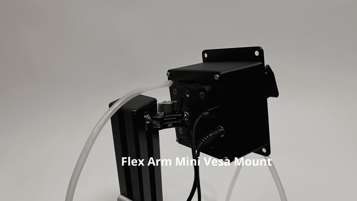 rear of drinkbox sim racing drink system attached with flex arm mini on a carbon textured vesa plate, shown against a neutral gray background with white text overlay reading 'Flex Arm Mini Vesa Mount'.
