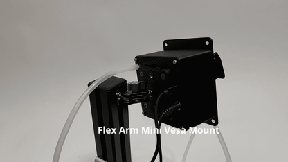 rear of drinkbox sim racing drink system attached with flex arm mini on a carbon textured vesa plate, shown against a neutral gray background with white text overlay reading 'Flex Arm Mini Vesa Mount'.