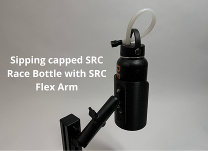 A black sipping-capped race bottle with a curved white straw and a black flex arm mount, shown against a light gray background with white text reading 'Sipping capped SRC Race Bottle with SRC Flex Arm'.